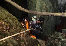 Heavy rains threaten to delay search for 2 people missing in Laos cave