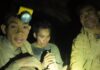 Rescuers work to drain flooded Laos cave to free 5 villagers and search for 2 still missing