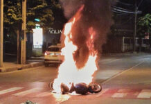 Motorcycle bursts into flames after crash in Bangkok Motorcycle bursts into flames after crash in Bangkok