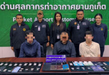 Three foreigners held at Phuket airport with 38 phones Three foreigners held at Phuket airport with 38 phones