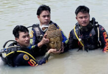 Shellfish diver finds Buddha head mistaken for durian Shellfish diver finds Buddha head mistaken for durian
