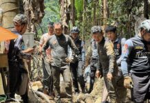 Rescuers call off search for two trapped in Laos cave after floods and earthquake block mission