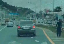 Man filmed throwing rocks at cars on Phuket bypass road Man filmed throwing rocks at cars on Phuket bypass road