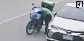 Rider Caught on Camera Picking Up Wallet, Driving Off Rider Caught on Camera Picking Up Wallet, Driving Off