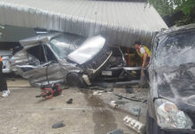 Sedan crashes into car lot, driver dies, drugs found Sedan crashes into car lot, driver dies, drugs found