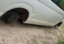 Van Left Overnight by Lam Takhong Dam Stripped of All Wheels Van Left Overnight by Lam Takhong Dam Stripped of All Wheels