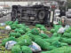 Lorry overturns after tyre blowout, spilling 100 sacks of limes across road Lorry overturns after tyre blowout, spilling 100 sacks of limes across road