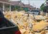 Village wall collapses in Chonburi after foam waste washed into homes