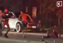 Shirtless man injures two police officers with iron bar in Saraburi