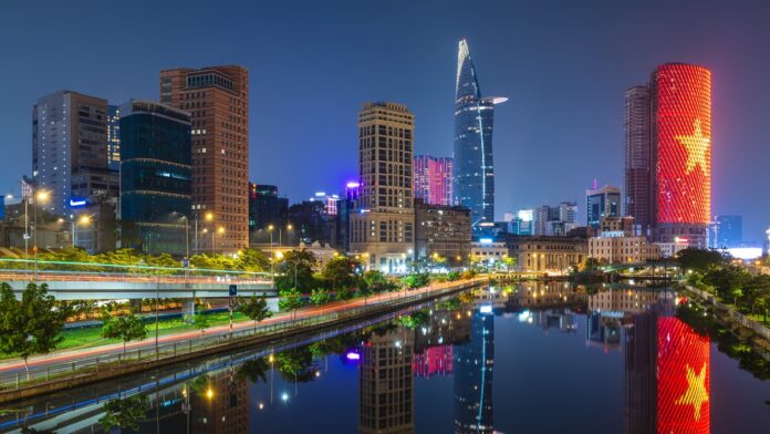 Skyline of Ho Chi Minh City CBD by Ben Nghe Channel in Vietnam