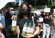 Activists rally outside Chinese embassy over river pollution Activists rally outside Chinese embassy over river pollution
