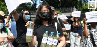 Activists rally outside Chinese embassy over river pollution Activists rally outside Chinese embassy over river pollution