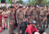 Two hurts as protesters clash with police at China consulate