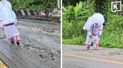 ‘Astronaut' walks on crater-like road in Kanchanaburi
