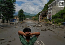 At least 160 dead and hundreds more missing after flash floods sweep through Nepal-China border