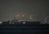 USS Abraham Lincoln sails past Singapore on its way home from Middle East
