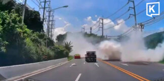 White smoke engulfs Phuket road after pickup truck breaks down