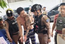 US man arrested after slashing Bangkok cop’s throat with box cutter