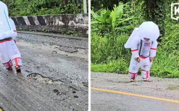 ‘Astronaut’ walks on crater-like road in Kanchanaburi ‘Astronaut’ walks on crater-like road in Kanchanaburi