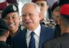 Malaysia’s king allows former leader Najib to serve rest of his graft sentence under house arrest