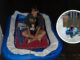 Athletes turn inflatable pool into boat amid Bangkok floods Athletes turn inflatable pool into boat amid Bangkok floods