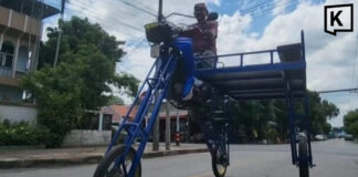 Yala welder builds raised motorcycle to tackle floodwaters Yala welder builds raised motorcycle to tackle floodwaters