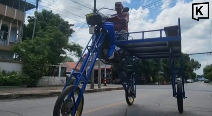 Yala welder builds raised motorcycle to tackle floodwaters Yala welder builds raised motorcycle to tackle floodwaters