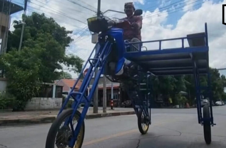 Yala welder builds raised motorcycle to tackle floodwaters Yala welder builds raised motorcycle to tackle floodwaters