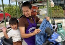 Baby joins mum on her daily noodle-selling rounds