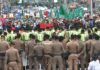 Shipping containers return to Bangkok streets as farmers protest IMF-World Bank meetings