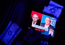 Israelis vote in a tense national election seen as a referendum on Netanyahu
