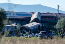 High-speed train hits stopped train in central Spain, killing at least 10