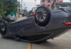 Crash flips car in narrow Bangkok soi, injuring two Crash flips car in narrow Bangkok soi, injuring two
