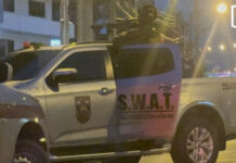 Armed man surrenders after asking to hug mother, wife