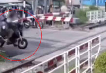 Motorcyclist killed after riding past lowered railway crossing barrier in Pattaya