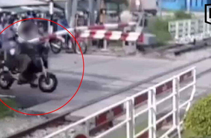 Motorcyclist killed after riding past lowered railway crossing barrier in Pattaya