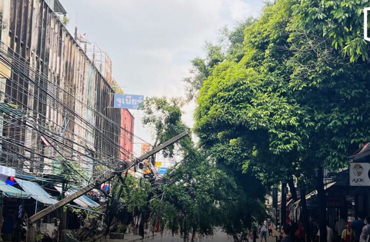 Power pole crashes down as strong winds and heavy rain hit Bangkok Power pole crashes down as strong winds and heavy rain hit Bangkok