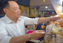 Thai PM hands out longan juice to tourists, promotes local treats