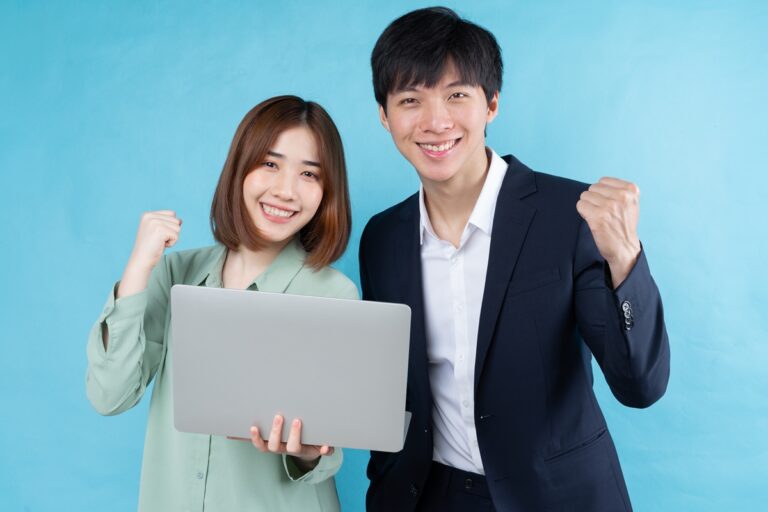 playful business couple image isolated blue background