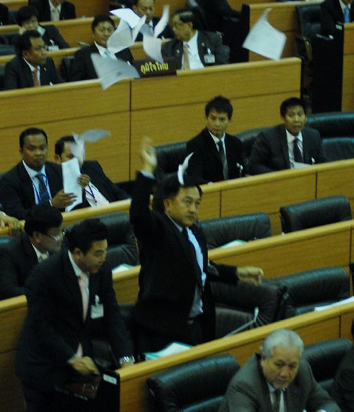 A Democrat MP tears the draft of Amnesty Bill to pieces as he exits the Parliament