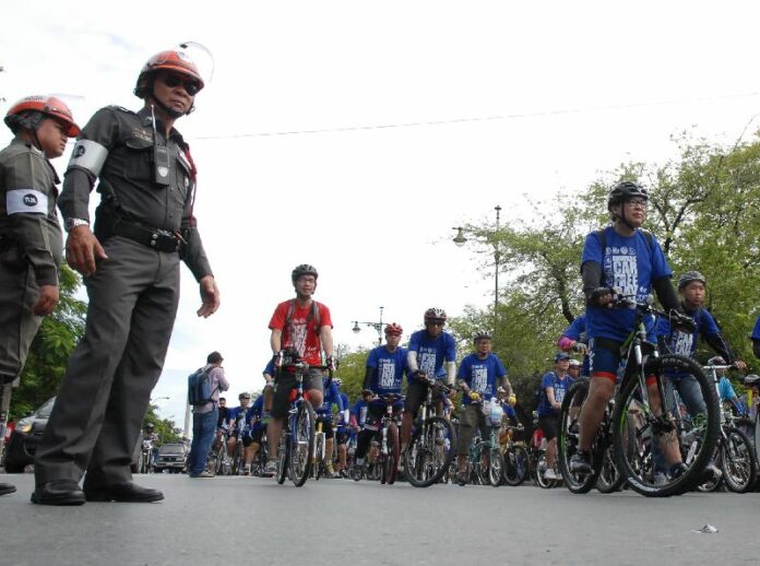 Cyclists participating in 2013 Bangkok's 'Car Free Day' event. Cyclists participating in 2013 Bangkok's 'Car Free Day' event.