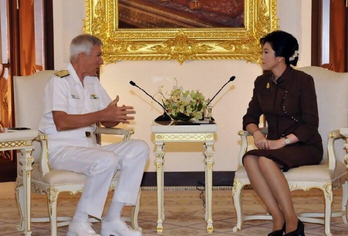 US Pacific Commander, Admiral Samuel J. Locklear, talking with Prime Minister Yingluck Shinawatra