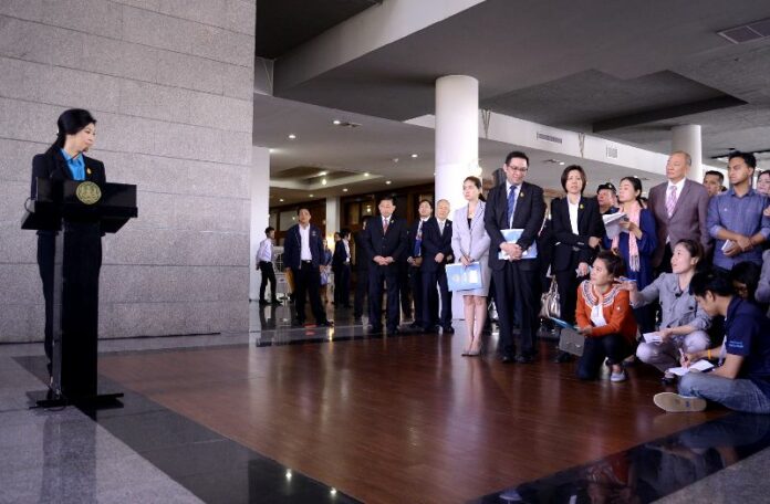 Prime Minister Yingluck Shinawatra taking questions from reporters, 17 December 2013