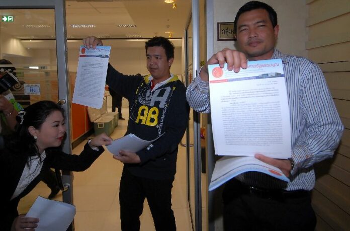 Officials handing out full verdict of the Constitutional Court to reporters, 24 January 2014