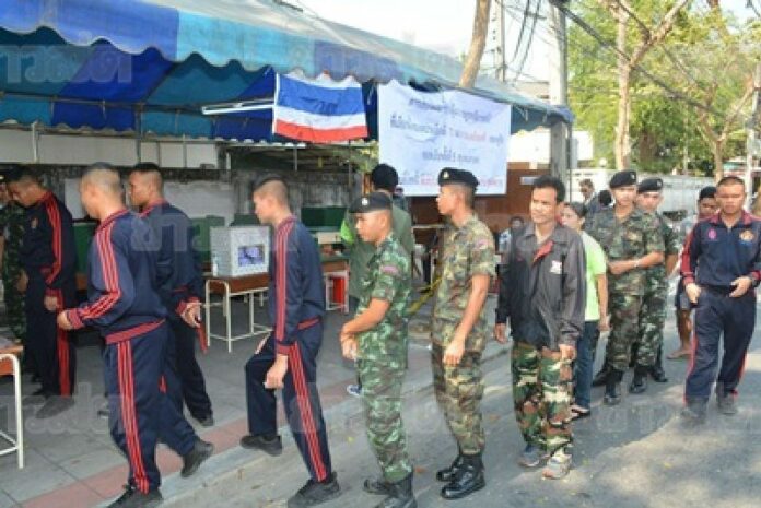 Soldiers queuing up for voting at a polling station in Dusit area, 2 February 2014