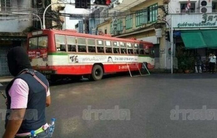 Bus commandeered and used as a road block by anti-government protesters near Giant Swing, 18 February 2014