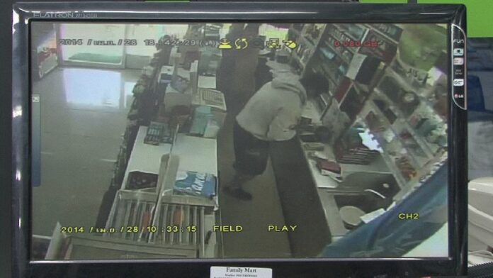 CCTV footage of an armed robbery in a Family Mart on Koh Samui Island, 29 April 2014.