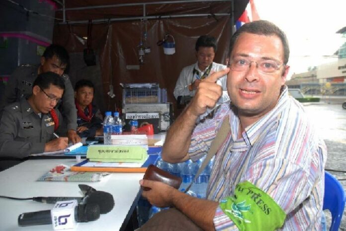 German photojournalist Nick Nostitz filing a complaint with the police after he was attacked by PCAD demonstrators in November 2013.