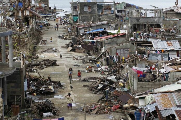 A November 2013 file photo shows the destruction in the typhoon-damaged coastal town of Marabut of Eastern Samar Province, Philippines. Photo: DPA