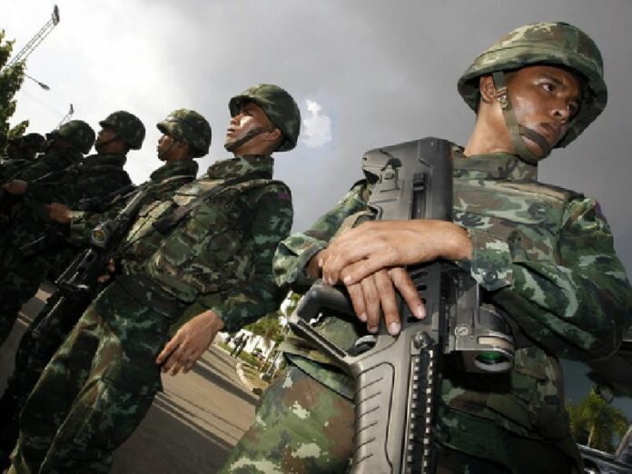Thai armed soldiers take position after a meeting between the army and the main political rivals. Thai Army Chief Prayuth Chan-ocha announced a coup after his efforts to reconcile rival political factions failed (DPA).